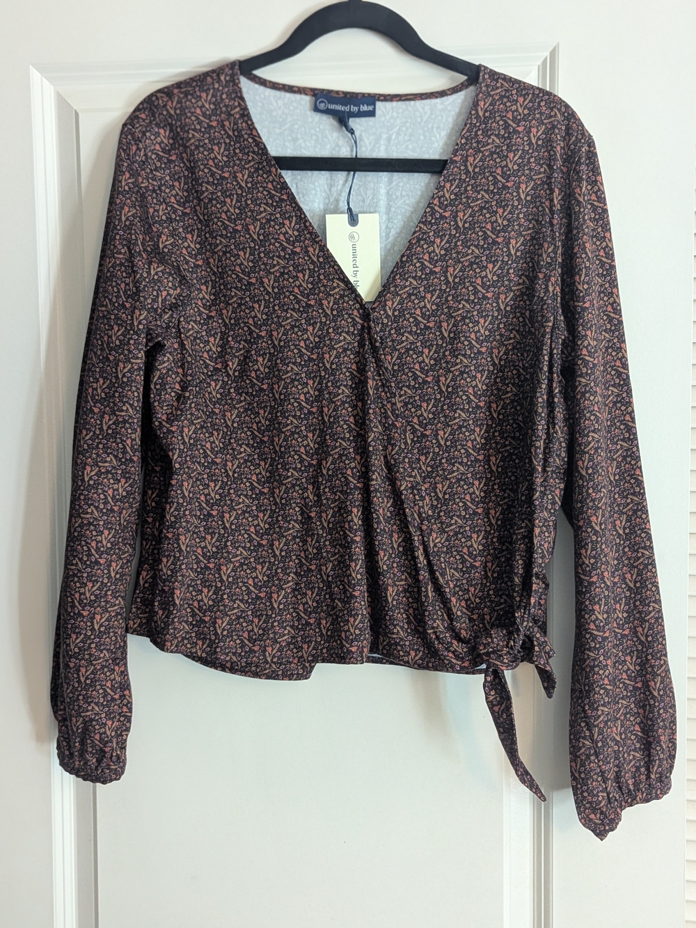 united by blue Women's Long Sleeve V-Neck Wrap Top in Black with Pink Print